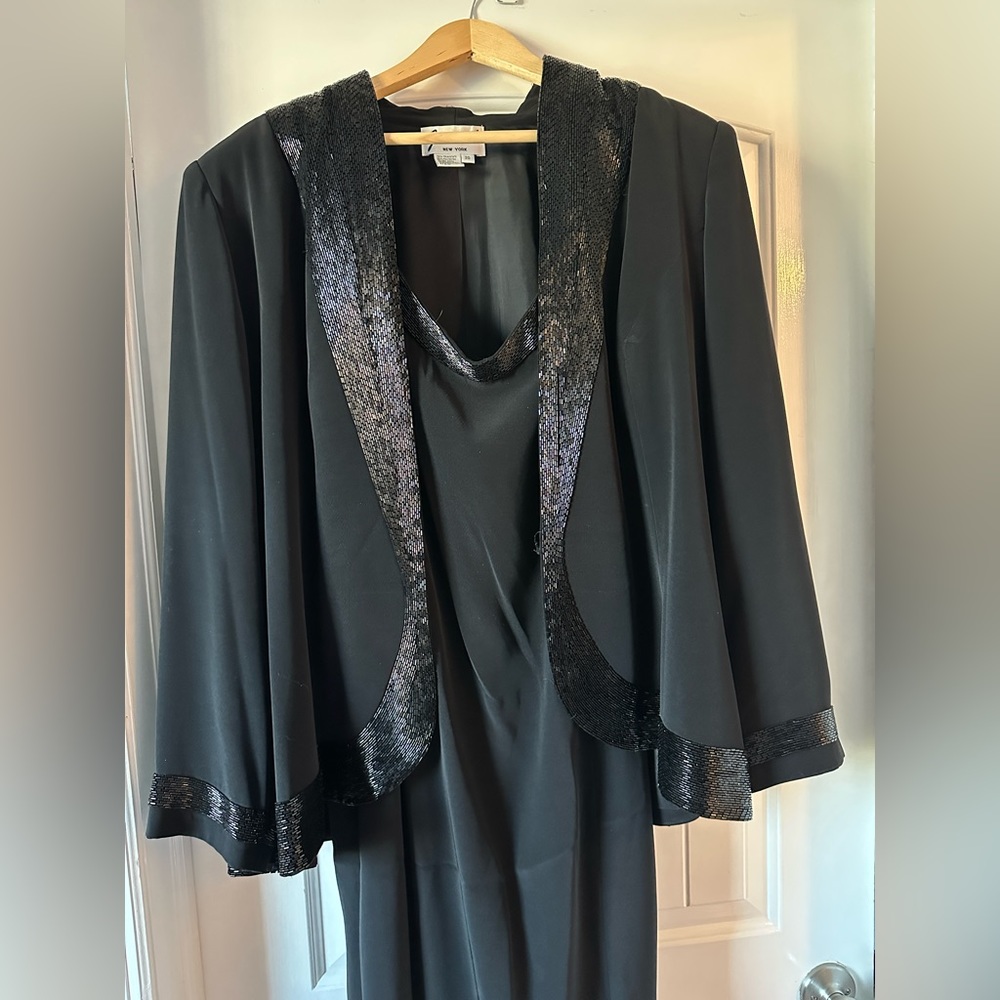 Black evening gown with jacket.